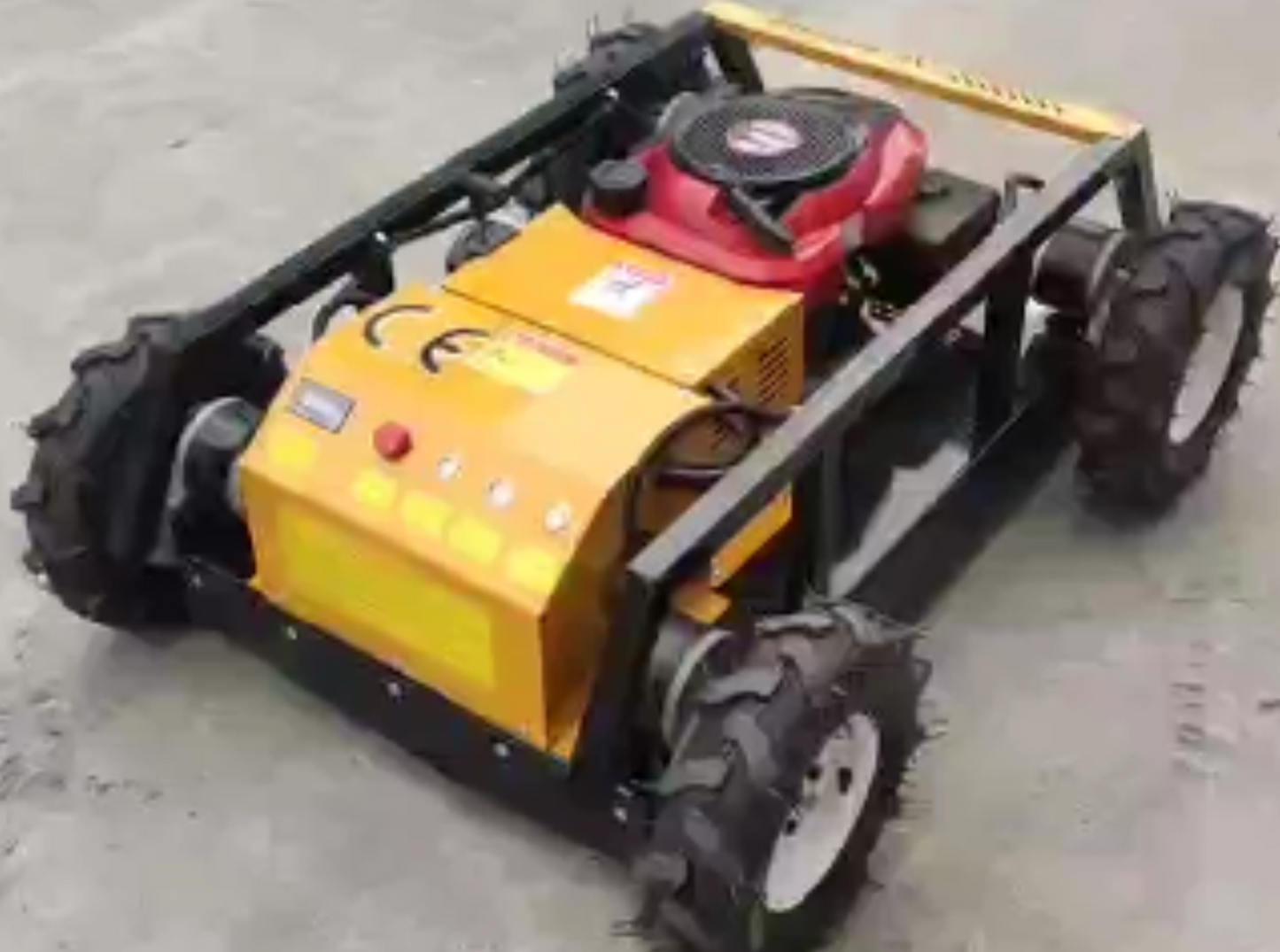 Yellow and black machine with wheels on a concrete surface