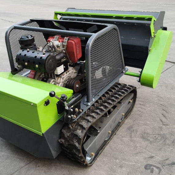 Remote Control Mower Big Boar 1200mm cut diesel all terrain flail mower at full lift. The lift is amongst the highest of any machine in its class allowing extraordinary offroad performance.