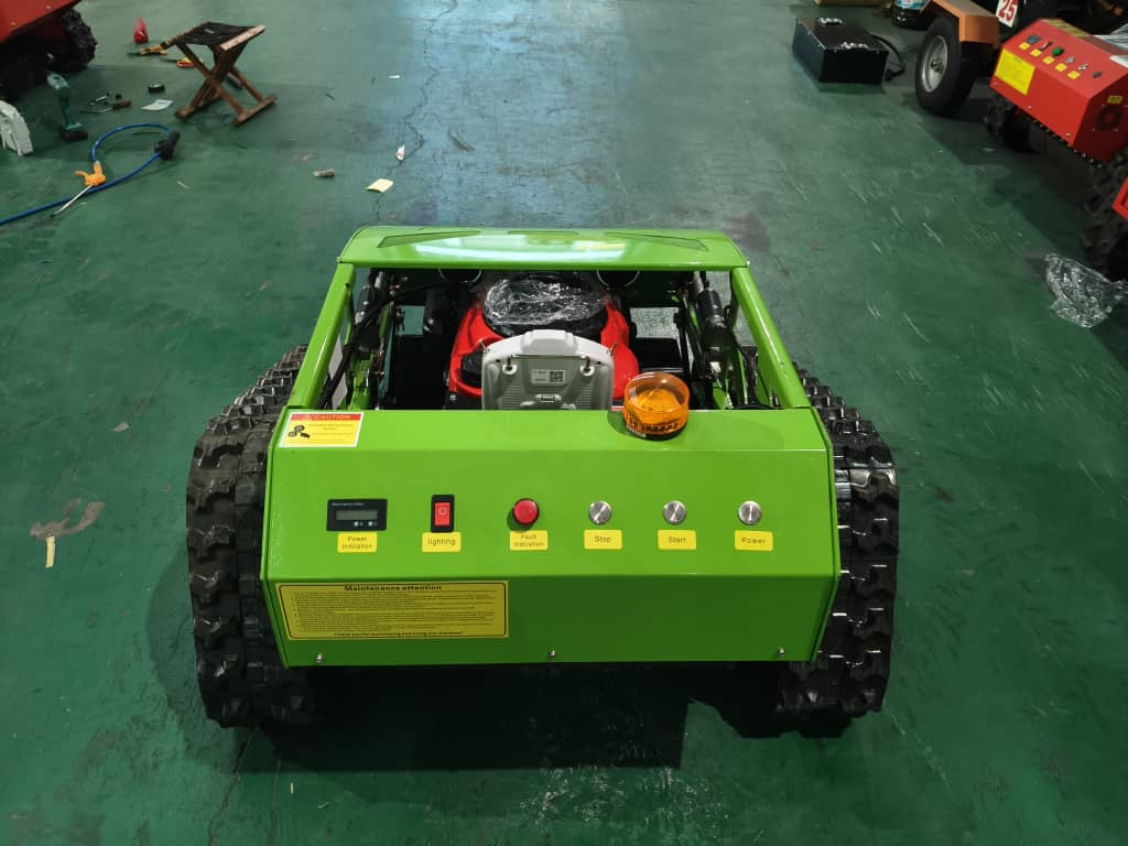 Green robot chassis with wheels on a green floor
