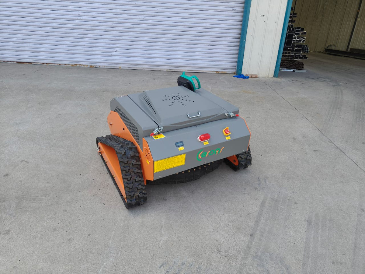 Redback remote control lawn mower with steel body and tracked wheels, designed for efficient weed removal.