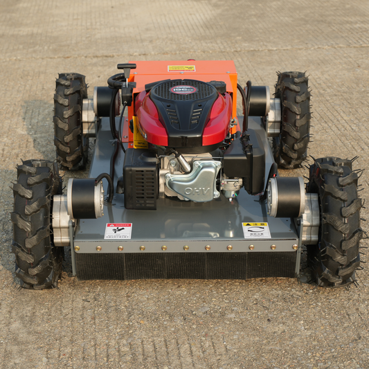 Mower with large wheels on a concrete surface