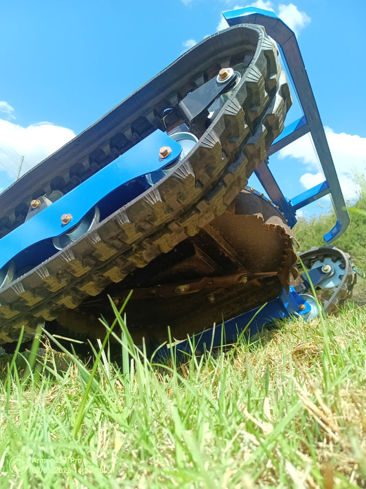 Remote control mower in action clearing a drain
www.rebelmowers.com.au