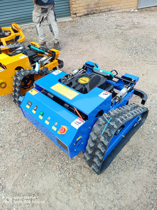 Typhoon remote control mower from Rebel Mowers Hastings. Reclaim lost land. Get in around and under where no mower has ever been before. A typhoon remote control mower can clear sites with slopes at  up to 40 degrees