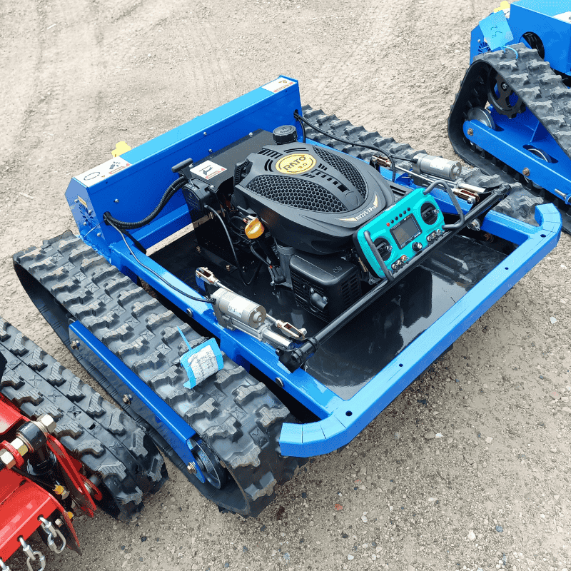 Remote control all-terrain lawn mower featuring tank treads and powerful engine for extreme terrain performance.