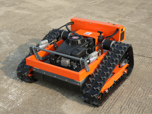 Orange tracked Typhoon RC mower www.rebelmowers.com.au