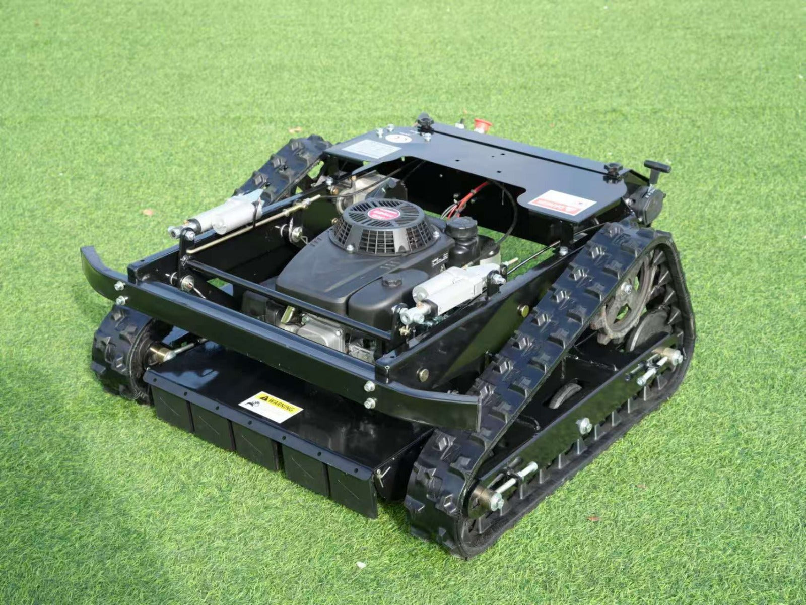 7.5 Hp 550mm cut Typhoon remote control lawn mower 20-150mm height adjustable with optional bulbar www.rebelmowers.com.au