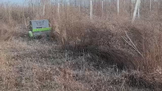 Remote Control Mower Big Boar 1200mm cut Heavy Duty all terrain flail mower cutting long grass. The flail design gives the blades easy access to the vegetation allowing overgrown land to be reclaimed easily.
